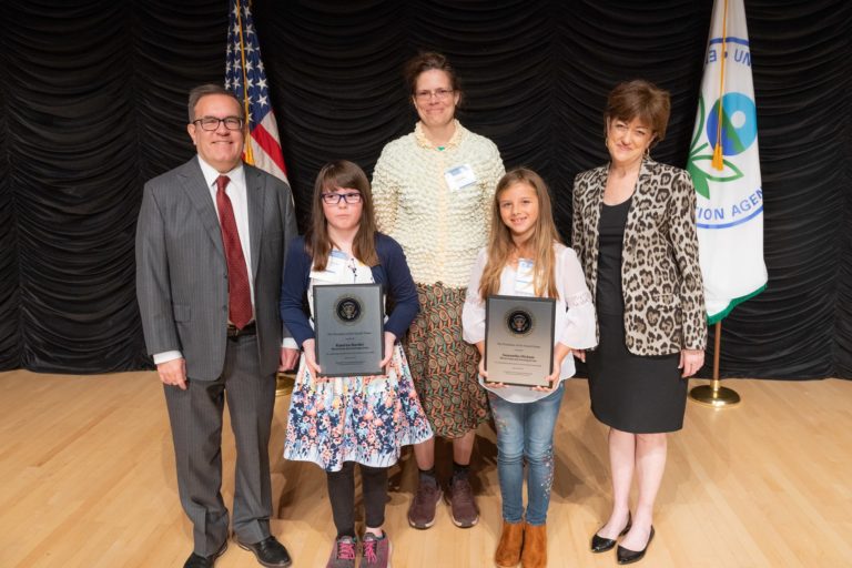 2019 Patsy Collins Award Recipient Sarah Hart and two of her students as they receive the EPA President's Youth Award.