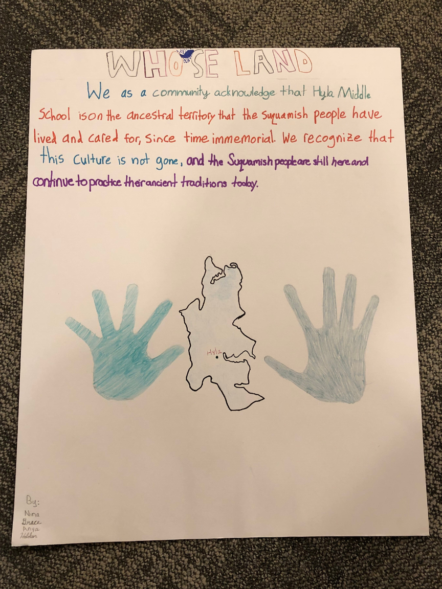 [Image description: one of the land acknowledgments that the Hyla Middle School students created. The text reads: "We as a community acknowledge that Hyla Middle School is on the ancestral territory that the Suquamish people have lived and cared for since time immemorial. We recognize that this culture is not gone, and the Suquamish people are still here and continue to practice their ancient traditions today"]