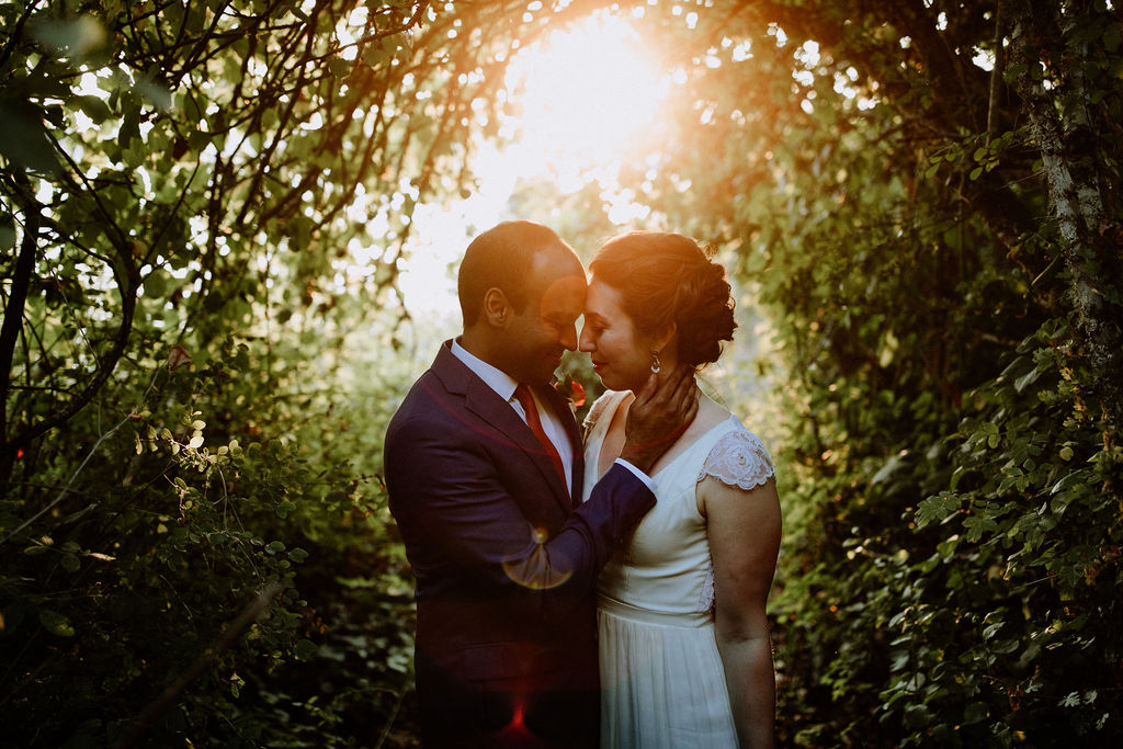 a romantic shot of a wedding couple at IslandWood, an Outdoor Wedding Venue