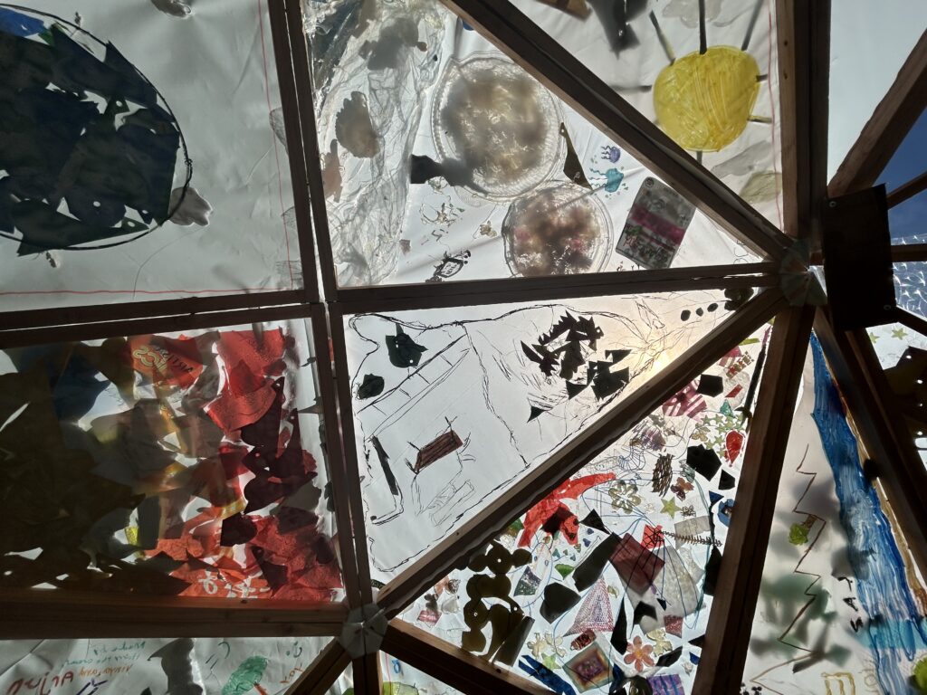 As part of our Artist in Residence program, artist Erin Kollar guided students visiting our School Overnight Program to explore sustainability and creative reuse by constructing a 3-D dome shelter entirely out of recycled materials.